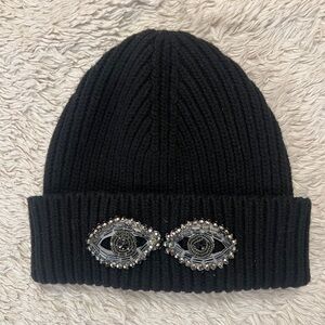 BCBG women’s black knitting skull cap with evil eye crystal bead appliqué